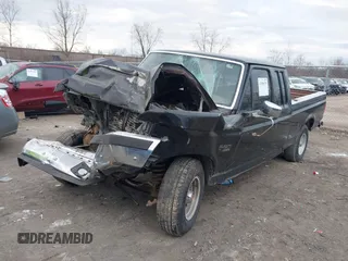 1990 Ford F-150 with VIN 1FTEX15NXLKB49682, listed as a IAAI auction lot 41898579 with 32,935 mi miles and . Bid and sale history available at DreamBid. Image 2.