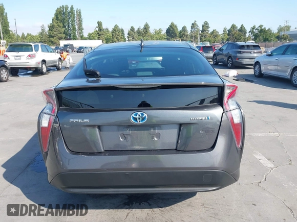 2016 Toyota Prius Two z VIN JTDKBRFU9G3507845, wystawiony jako IAAI lot #42410176 z przebiegiem 187 220 mil mil oraz . Historia ofert i sprzedaży dostępna na DreamBid. Obrazek 16.