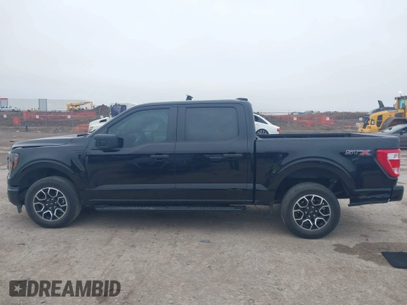 2023 Ford F-150 XL with VIN 1FTEW1C55PKD01184, listed as a IAAI auction lot 41700658 with 18,804 mi miles. Bid and sale history available at carsss.com. Image 14.