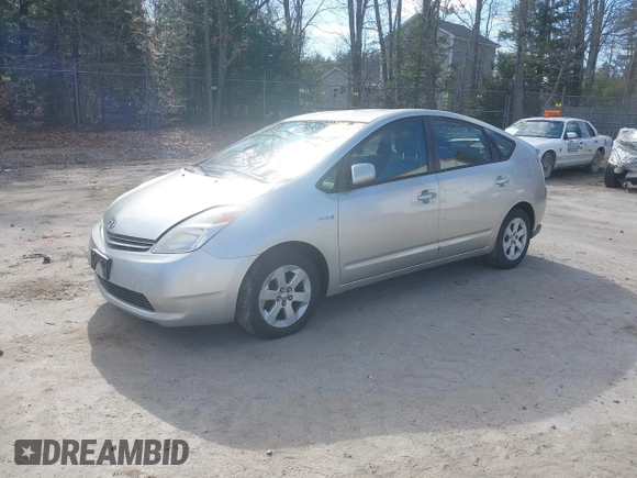 2005 Toyota Prius with VIN JTDKB20U653014332, listed as a IAAI auction lot 42010139 with 128,147 mi miles. Bid and sale history available at carsss.com. Image 2.