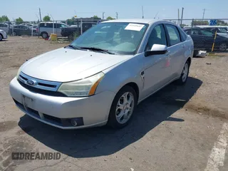 2008 Ford Focus SE with VIN 1FAHP35N28W300528, listed as a IAAI auction lot 42149643 with 138,115 mi miles. Bid and sale history available at carsss.com. Image 2.