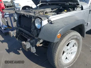 2017 Jeep Wrangler Sport with VIN 1C4GJWAG0HL621498, listed as a IAAI auction lot 42494667 with 92,284 mi miles and . Bid and sale history available at DreamBid. Image 19.