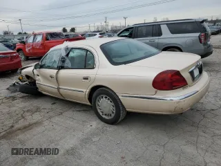 1998 Lincoln Continental with VIN 1LNFM97V5WY720999, listed as a Copart auction lot 84705054 with 0 mi miles and Salvage Title. Bid and sale history available at carsss.com. Image 2.