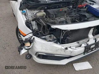 2020 Honda Civic LX with VIN 2HGFC2F64LH593100, listed as a IAAI auction lot 41877572 with 76,713 mi miles and . Bid and sale history available at DreamBid. Image 6.