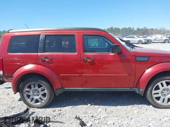 2010 Dodge Nitro SE with VIN 1D4PT2GK7AW142856, listed as a IAAI auction lot 41855687 with 197,248 mi miles. Bid and sale history available at carsss.com. Image 14.