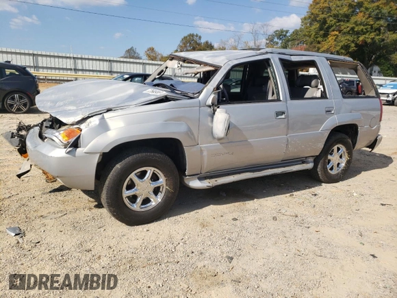 2000 GMC Denali z VIN 1GKEK13R2YR138523, wystawiony jako Copart lot #77609804 z przebiegiem 203 514 mil mil oraz Szkody całkowita. Historia ofert i sprzedaży dostępna na DreamBid. Obrazek 1.