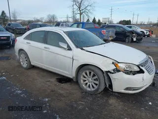 2014 Chrysler 200 Limited with VIN 1C3CCBCG2EN186518, listed as a IAAI auction lot 41521448 with 63,527 mi miles and . Bid and sale history available at DreamBid. Image 1.