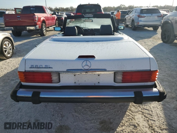 1989 Mercedes-Benz 560 SL с VIN WDBBA48D4KA104474, выставлен на аукционе Copart как лот 76584374 с пробегом 118 252 миль миль и Списание • Salvage title. История ставок и продаж доступна на DreamBid. Изображение 6.