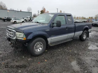 2002 Ford F-250 XL with VIN 1FTNX20F72EB02306, listed as a Copart auction lot 80972734 with 143,951 mi miles and Salvage title. Bid and sale history available at DreamBid. Image 1.