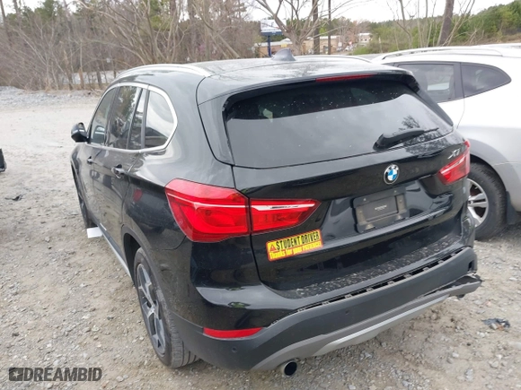 2018 BMW X1 xDrive28i with VIN WBXHT3C34J5K21576, listed as a IAAI auction lot 41822390 with 69,645 mi miles. Bid and sale history available at carsss.com. Image 3.