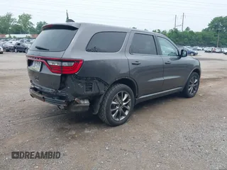 2014 Dodge Durango SXT z VIN 1C4RDJAG0EC562127, wystawiony jako IAAI lot #42456152 z przebiegiem 124 171 mil mil oraz . Historia ofert i sprzedaży dostępna na DreamBid. Obrazek 4.