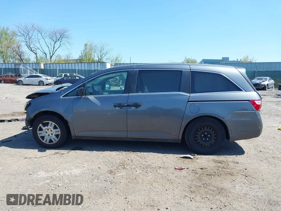 2013 Honda Odyssey LX with VIN 5FNRL5H23DB056331, listed as a IAAI auction lot 42069564 with Not Provided miles and . Bid and sale history available at carsss.com. Image 13.