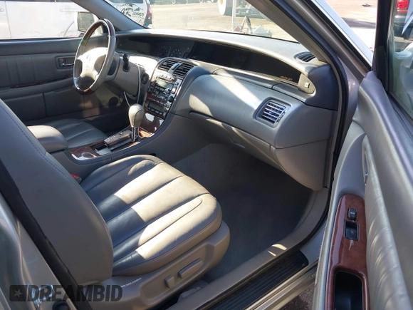 2003 Toyota Avalon XL z VIN 4T1BF28B03U321618, wystawiony jako IAAI lot #42297842 z przebiegiem 142 154 mil mil oraz . Historia ofert i sprzedaży dostępna na DreamBid. Obrazek 5.