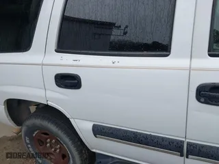 2003 Chevrolet Tahoe LT with VIN 1GNEC13Z63J126611, listed as a IAAI auction lot 41300437 with 313,885 mi miles. Bid and sale history available at carsss.com. Image 14.