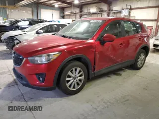 2014 Mazda CX-5 Sport with VIN JM3KE4BE2E0429553, listed as a Copart auction lot 85136584 with 209,988 mi miles and Salvage Title. Bid and sale history available at carsss.com. Image 1.