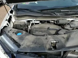 2023 Honda Passport TrailSport z VIN 5FNYF8H62PB024949, wystawiony jako Copart lot #66750385 z przebiegiem 22 696 mil mil oraz Szkoda całkowita • Salvage title. Historia ofert i sprzedaży dostępna na DreamBid. Obrazek 16.