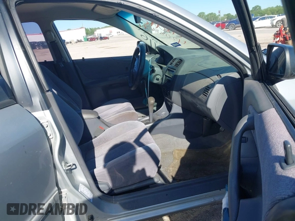 2000 Mazda Protege ES with VIN JM1BJ2213Y0284890, listed as a IAAI auction lot 42088671 with 215,104 mi miles and . Bid and sale history available at DreamBid. Image 5.