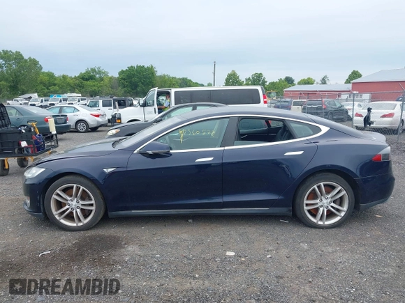 2014 Tesla Model S 60 with VIN 5YJSA1H19EFP32063, listed as a IAAI auction lot 42360872 with 103,495 mi miles and . Bid and sale history available at DreamBid. Image 14.