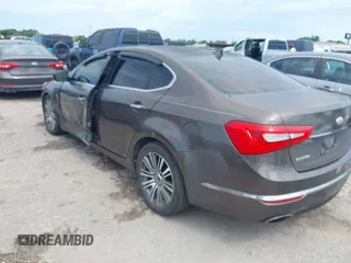 2014 Kia Cadenza Premium z VIN KNALN4D74E5144896, wystawiony jako IAAI lot #42466220 z przebiegiem 157 654 mil mil oraz . Historia ofert i sprzedaży dostępna na DreamBid. Obrazek 3.