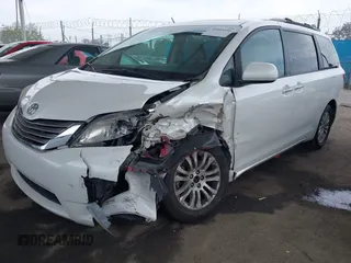 2015 Toyota Sienna XLE with VIN 5TDYK3DC5FS640102, listed as a IAAI auction lot 41885194 with 119,972 mi miles. Bid and sale history available at carsss.com. Image 20.