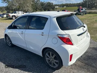 2012 Toyota Yaris L with VIN JTDKTUD36CD523080, listed as a Copart auction lot 80987914 with 134,041 mi miles and Clean Title. Bid and sale history available at carsss.com. Image 3.