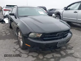 2012 Ford Mustang V6 Premium with VIN 1ZVBP8AM3C5234884, listed as a IAAI auction lot 41880779 with 149,758 mi miles. Bid and sale history available at carsss.com. Image 1.