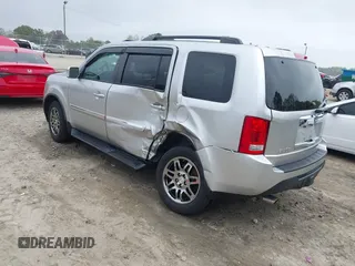 2014 Honda Pilot Touring with VIN 5FNYF4H91EB011934, listed as a IAAI auction lot 41929415 with 227,343 mi miles and . Bid and sale history available at DreamBid. Image 3.