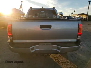 2014 Toyota Tacoma PreRunner with VIN 3TMKU4HNXEM041311, listed as a Copart auction lot 84065684 with 212,473 mi miles and Salvage title. Bid and sale history available at DreamBid. Image 6.