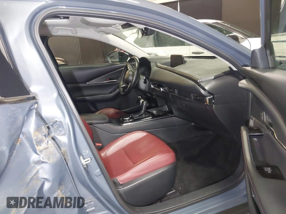 2022 Mazda CX-30 S Carbon Edition with VIN 3MVDMBCL8NM447234, listed as a IAAI auction lot 42511600 with 51,926 mi miles and . Bid and sale history available at DreamBid. Image 5.