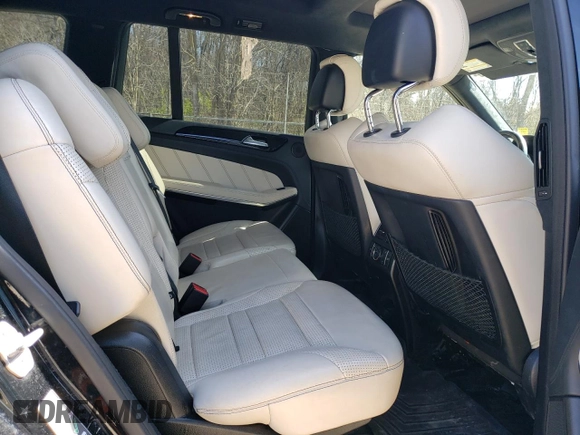 2018 Mercedes-Benz GLS 63 AMG z VIN 4JGDF7FE8JB003032, wystawiony jako Copart lot #52588105 z przebiegiem 182 799 mil mil oraz Czysty tytuł • Clean title. Historia ofert i sprzedaży dostępna na DreamBid. Obrazek 11.