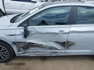 2019 Volkswagen Jetta SEL с VIN 3VWE57BUXKM063071, выставлен на аукционе IAAI как лот 42058223 с пробегом 96 597 миль миль и . История ставок и продаж доступна на DreamBid. Изображение 6.