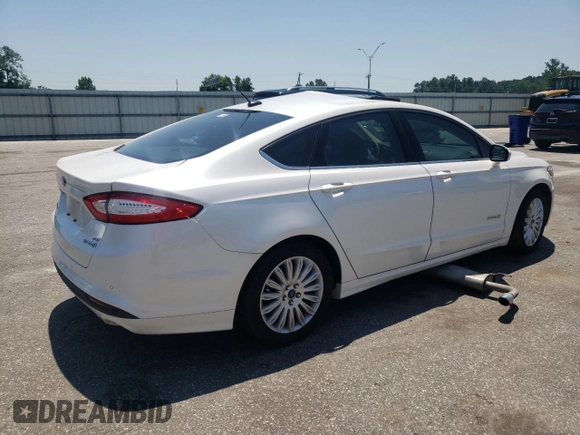 2015 Ford Fusion SE Hybrid z VIN 3FA6P0LU8FR105615, wystawiony jako Copart lot #61451155 z przebiegiem 106 778 mil mil oraz Szkoda całkowita • Salvage title. Historia ofert i sprzedaży dostępna na DreamBid. Obrazek 3.