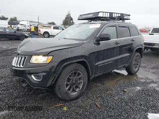 2015 Jeep Grand Cherokee Laredo with VIN 1C4RJFAGXFC602544, listed as a IAAI auction lot 41504666 with 190,170 mi miles. Bid and sale history available at carsss.com. Image 2.