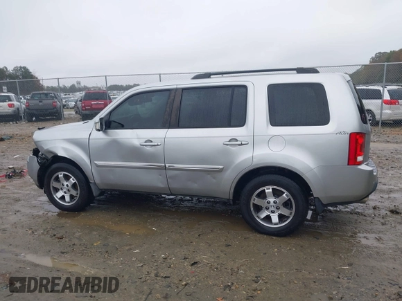 2010 Honda Pilot Touring with VIN 5FNYF3H89AB005861, listed as a IAAI auction lot 40828747 with 275,757 mi miles and . Bid and sale history available at DreamBid. Image 14.