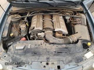 2006 Pontiac GTO z VIN 6G2VX12U06L550451, wystawiony jako Copart lot #54823105 z przebiegiem 273 049 mil mil oraz Tytuł czysty. Historia ofert i sprzedaży dostępna na DreamBid. Obrazek 11.