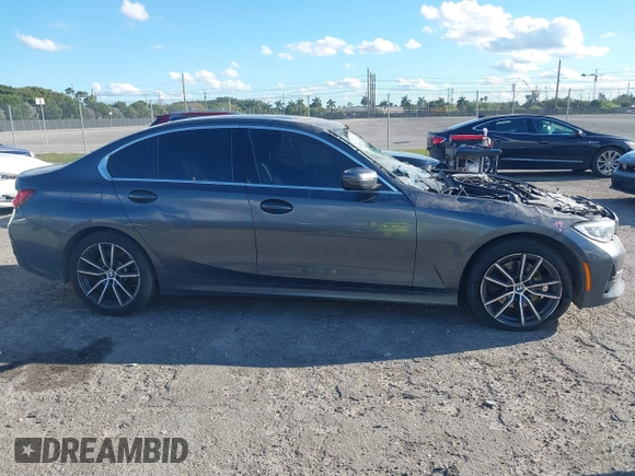 2021 BMW 3 Series 330i xDrive with VIN 3MW5R7J01M8B49173, listed as a IAAI auction lot 41672538 with 82,259 mi miles and . Bid and sale history available at carsss.com. Image 13.