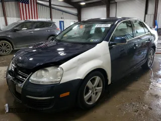 2009 Volkswagen Jetta SE z VIN 3VWRZ71K29M167800, wystawiony jako Copart lot #61451305 z przebiegiem 161 617 mil mil oraz Szkoda całkowita • Salvage title. Historia ofert i sprzedaży dostępna na DreamBid. Obrazek 1.