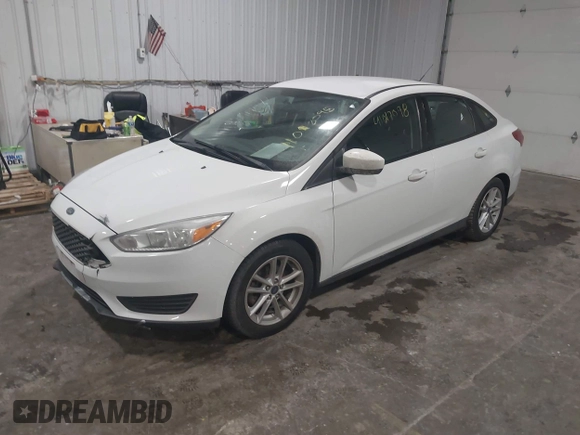 2018 Ford Focus SE with VIN 1FADP3F29JL312721, listed as a IAAI auction lot 41012098 with 126,214 mi miles. Bid and sale history available at carsss.com. Image 17.