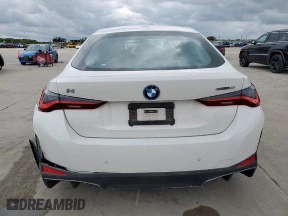 2024 BMW i4 eDrive35 with VIN WBY43AW08RFS83004, listed as a Copart auction lot 50818335 with 12,000 mi miles and Salvage Title. Bid and sale history available at carsss.com. Image 6.