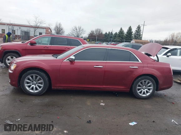 2013 Chrysler 300 C with VIN 2C3CCAEG4DH698893, listed as a IAAI auction lot 41189845 with 153,638 mi miles and . Bid and sale history available at DreamBid. Image 14.