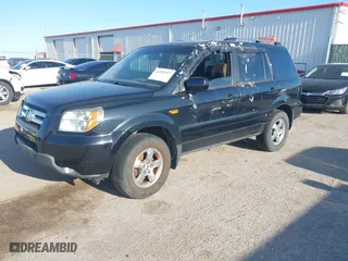2006 Honda Pilot EX-L with VIN 2HKYF185X6H540975, listed as a IAAI auction lot 41992327 with 211,898 mi miles. Bid and sale history available at carsss.com. Image 2.