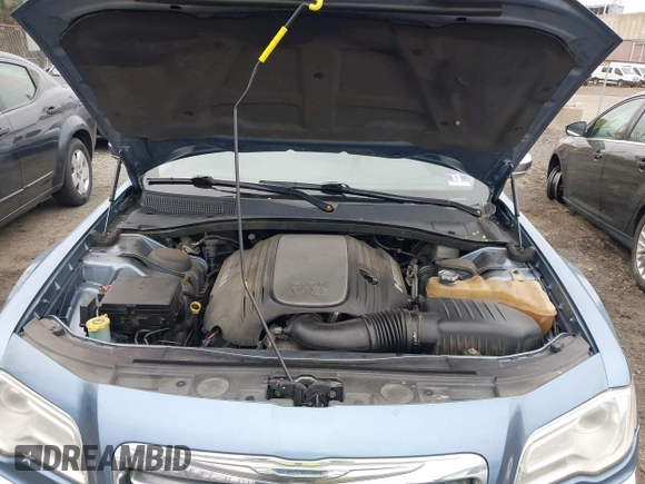 2011 Chrysler 300 with VIN 2C3CA6CT5BH575023, listed as a IAAI auction lot 42090856 with 200,309 mi miles. Bid and sale history available at carsss.com. Image 10.