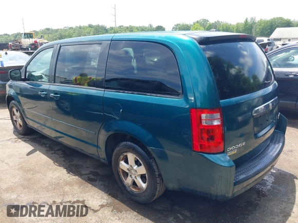 2009 Dodge Grand Caravan SE with VIN 2D8HN44E09R642823, listed as a IAAI auction lot 42606693 with 132,967 mi miles and . Bid and sale history available at DreamBid. Image 3.