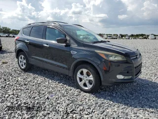 2013 Ford Escape SE with VIN 1FMCU0G94DUB72273, listed as a Copart auction lot 64097315 with 213,409 mi miles and Clean title. Bid and sale history available at DreamBid. Image 4.