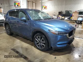 2018 Mazda CX-5 Grand Touring with VIN JM3KFBDM9J0411504, listed as a Copart auction lot 42050825 with 125,695 mi miles and Salvage Title. Bid and sale history available at carsss.com. Image 4.