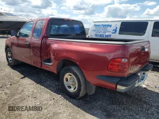 2001 Ford F-150 XL with VIN 1FTZX07261KA62955, listed as a Copart auction lot 56580915 with 159,451 mi miles and Salvage title. Bid and sale history available at DreamBid. Image 2.