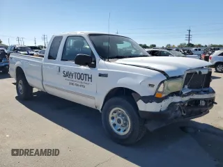 2003 Ford Super Duty F-250 XL with VIN 1FTNX21S93ED85966, listed as a Copart auction lot 71485154 with 114,837 mi miles and Salvage Title. Bid and sale history available at carsss.com. Image 4.