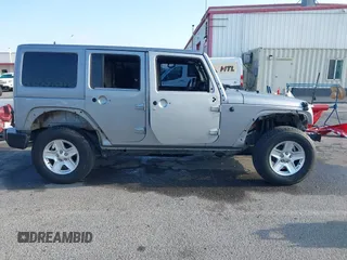 2018 Jeep Wrangler Unlimited Sport S with VIN 1C4HJWDG5JL839703, listed as a IAAI auction lot 42140205 with 61,604 mi miles and . Bid and sale history available at DreamBid. Image 14.