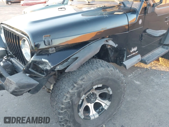 2004 Jeep Wrangler SE with VIN 1J4FA29184P762210, listed as a IAAI auction lot 40983051 with 107,525 mi miles and . Bid and sale history available at DreamBid. Image 6.