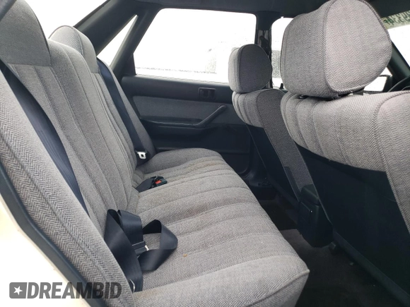 1988 Toyota Camry z VIN JT2SV21E7J3277138, wystawiony jako Copart lot #80039334 z przebiegiem 152 555 mil mil oraz Szkoda całkowita • Salvage title. Historia ofert i sprzedaży dostępna na DreamBid. Obrazek 10.